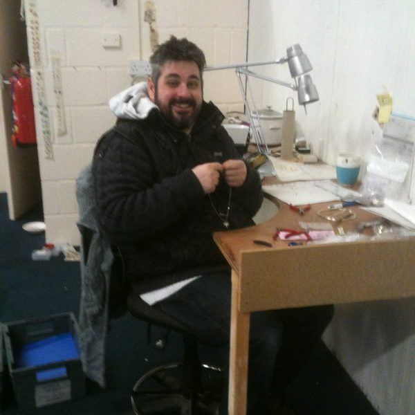 Dave assembles while the workshop disappears around him